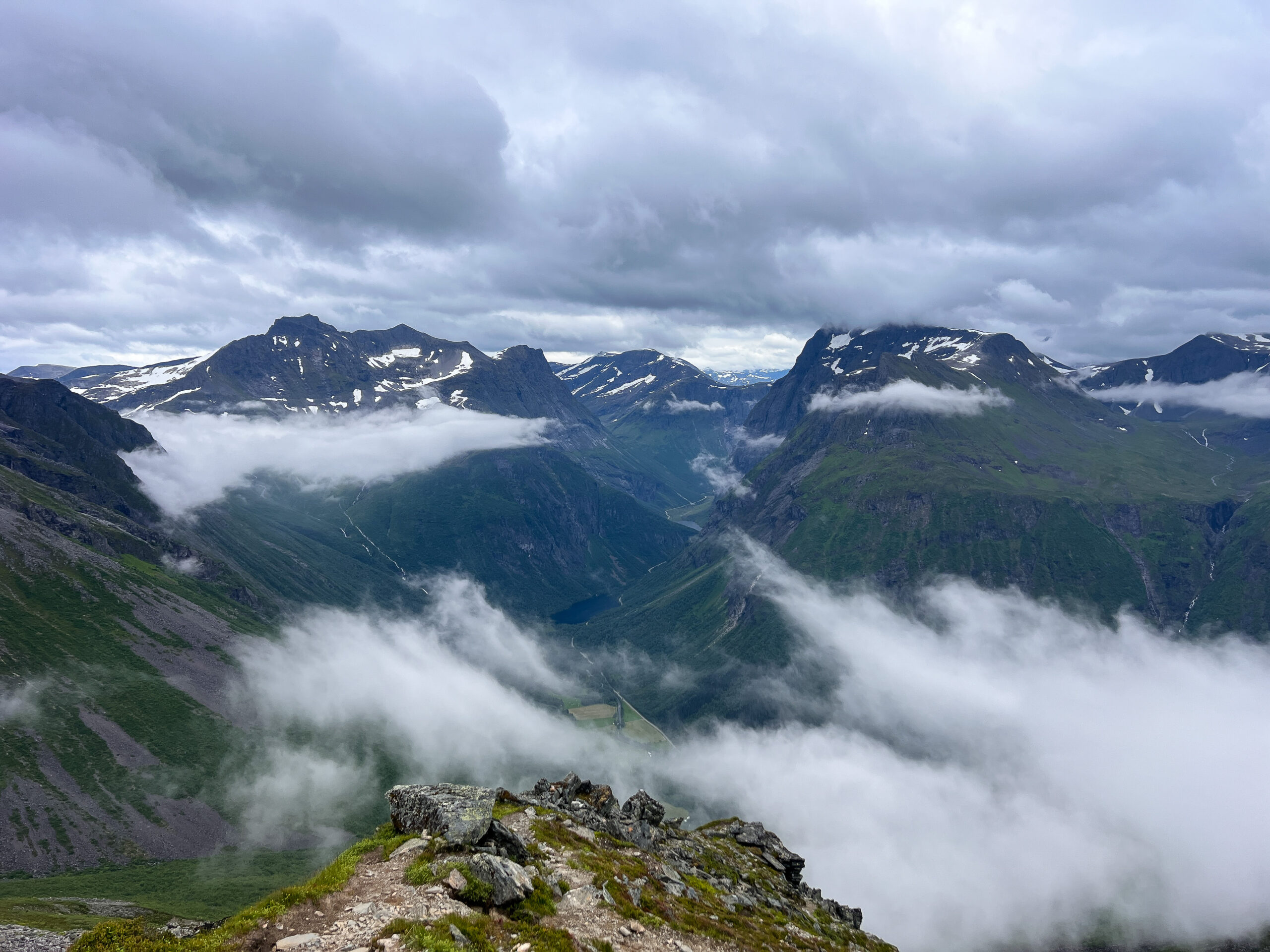 Mountain peaks rising above a sea of cloud.