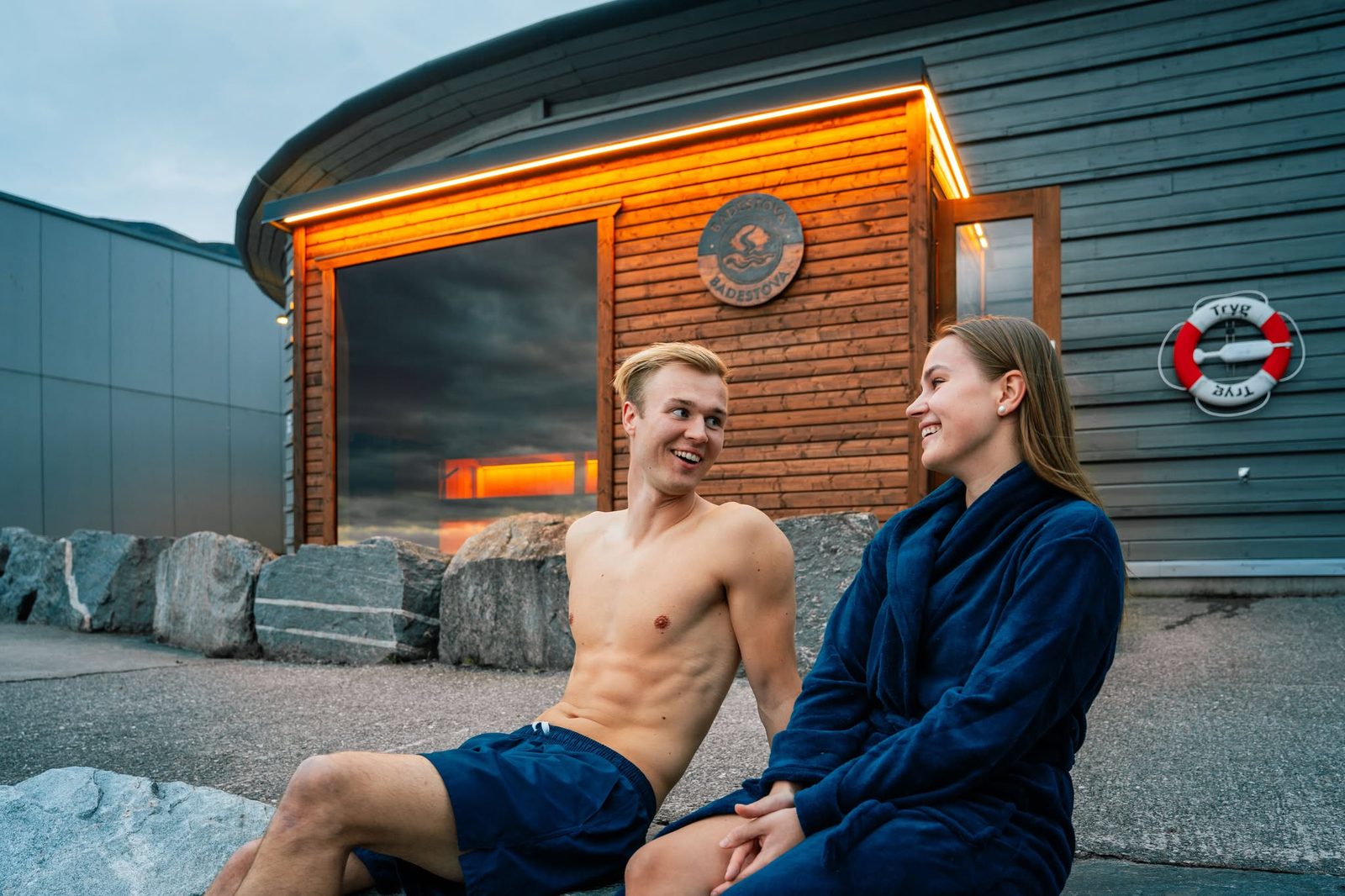 Outside the Badestova sauna Two guests outside the Badestova sauna on the fjord in Nordfjordeid