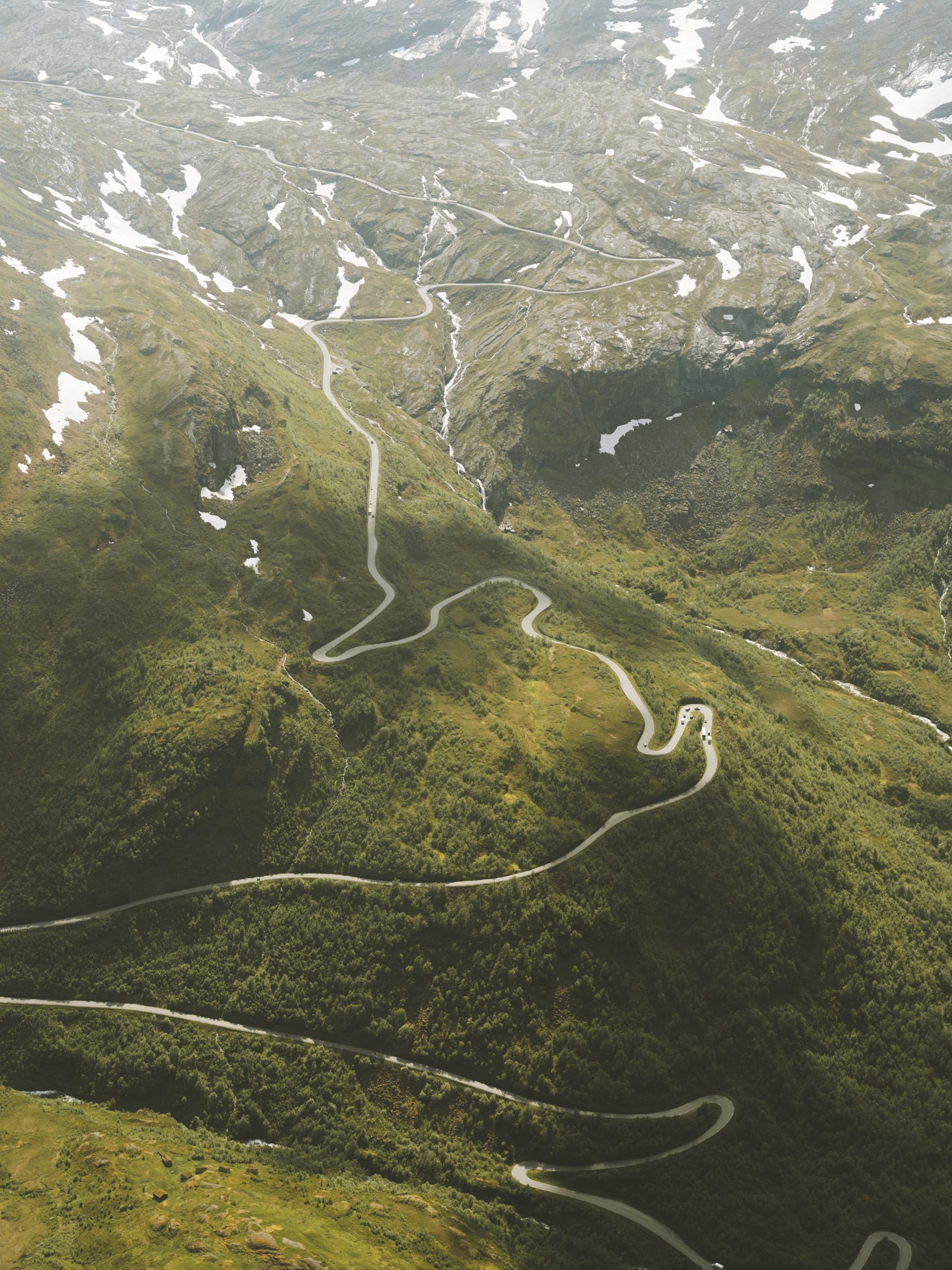 Winding mountain road seen from above.